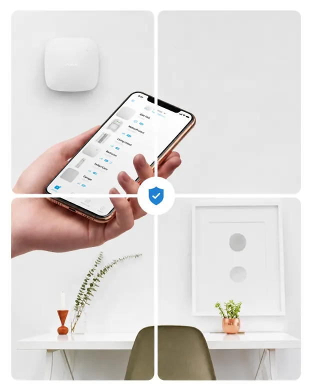 Ajax app on a phone with Hub and sensors in a modern home