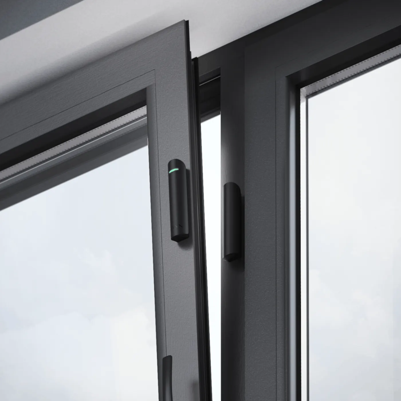 Ajax DoorProtect contact sensor on a window frame